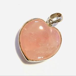 Beautiful heart shaped rose quartz 💗 encompassed by sterling silver neck charm